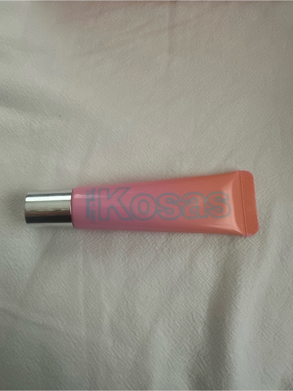 Kosas Sheer Pink-Orange Lip Gloss Tube
